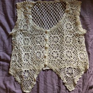 Various blouses including vintage crocheted vest ($35 for all of them)